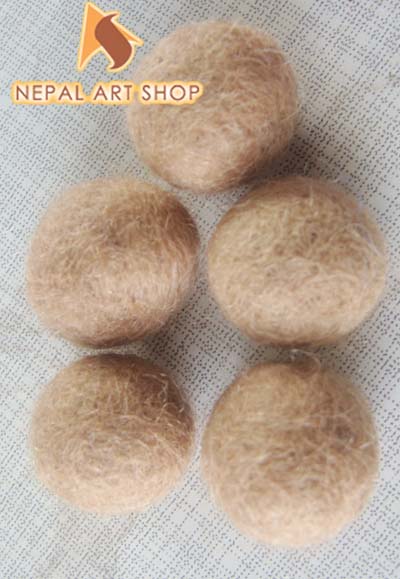 Felting wool balls and rugs projects, wool felt balls, felt wool rugs, wet felting, pom poms, nepal, wholesale, felt pom, diy felt, nepal, fair trade, felted wool, round rugs, pom pom