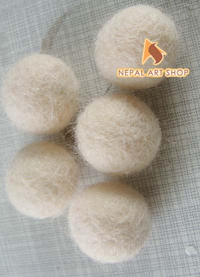 Felting wool balls and rugs projects, wool felt balls, felt wool rugs, wet felting, pom poms, nepal, wholesale, felt pom, diy felt, nepal, fair trade, felted wool, round rugs, pom pom