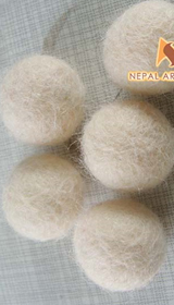 Wollfilzkugeln, Wollfilzteppiche, Nadelfilzen, Pom Poms, Nepal, Großhandel, Filzpom, DIY-Filz, Nepal, Fair Trade, gefilzte Wolle, runde Teppiche, Pom Pom